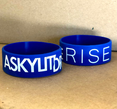 A Skylit Drive 1 inch "Rise" Rubber Wristband